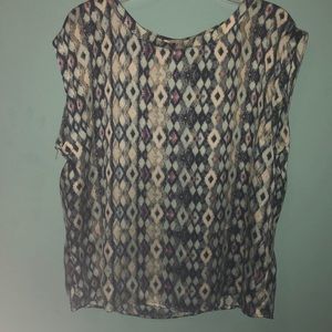 Diamond patterned blouse.